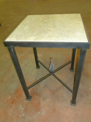 Ferro Designs LLC custom iron end table with a dark iron base finish and a travertine tile top.