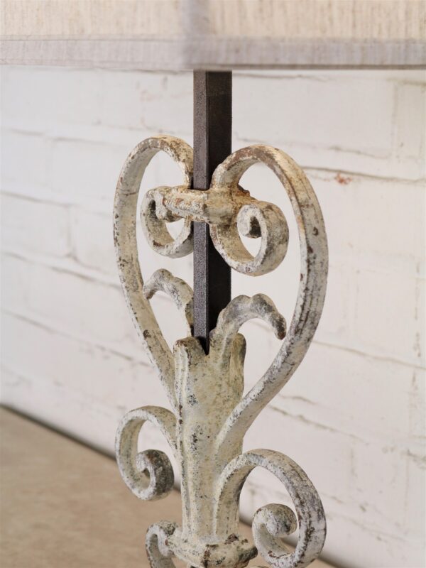 Heart scroll custom iron table lamp with white, distressed finish on dark iron base