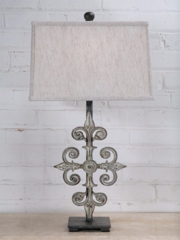 Cross custom iron table lamp with a white, distressed finish on a pewter base