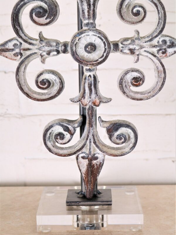 Cross custom iron table lamp with a white, distressed finish on an acrylic base