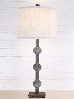 28 inch tall sphere custom iron table lamp with a gray, distressed finish and a dark iron base. Paired with a 12 inch drum linen lamp shade.