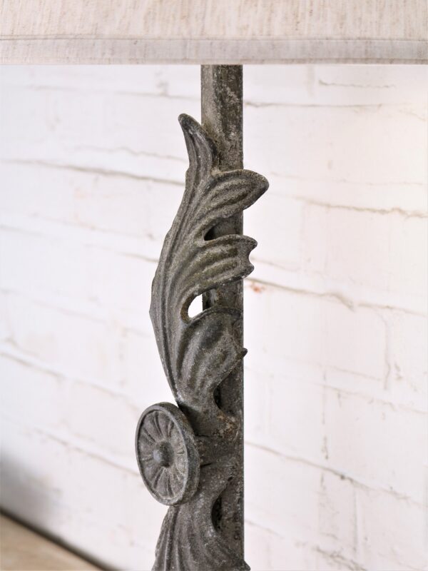 Leaf custom iron table lamp with a gray, distressed finish on an acrylic base.