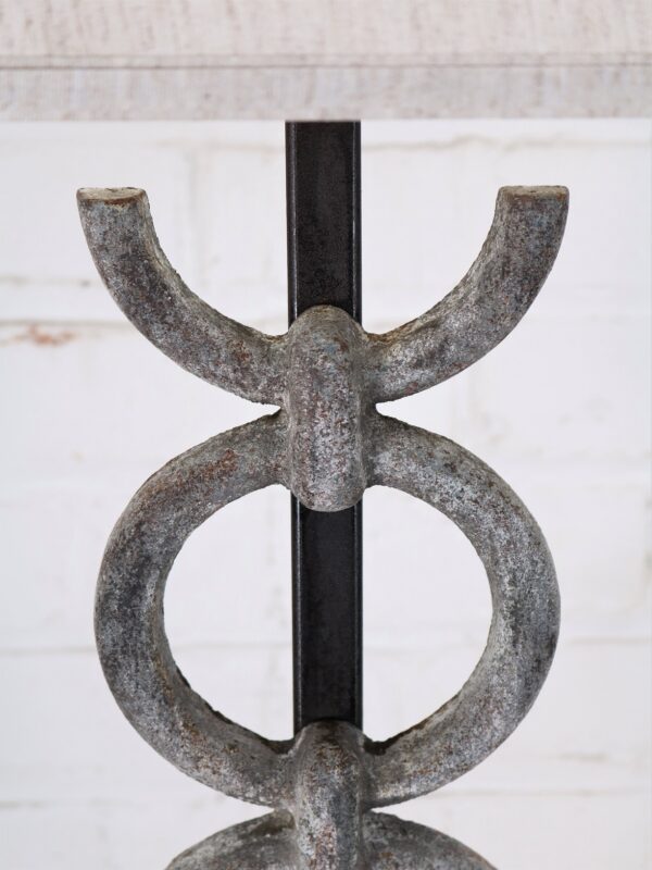 Rings custom iron table lamp with a gray, distressed finish.