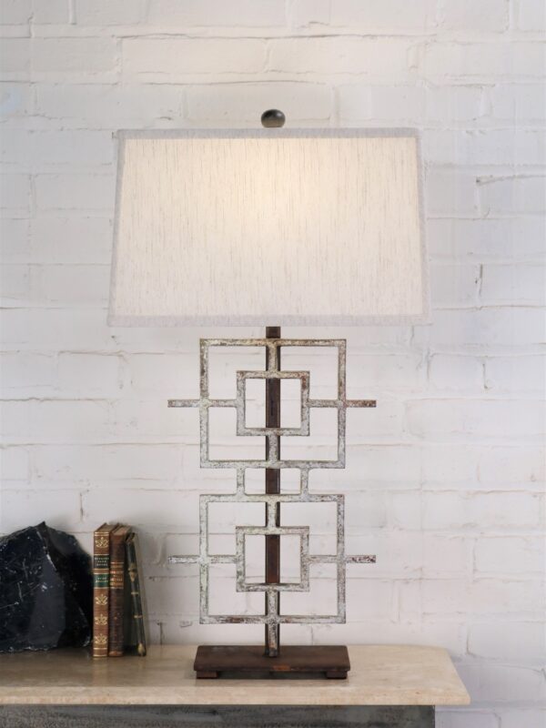 Squares custom iron table lamp with a white, distressed finish and a dark iron base. Paired with a 16 inch rectangle linen lamp shade.