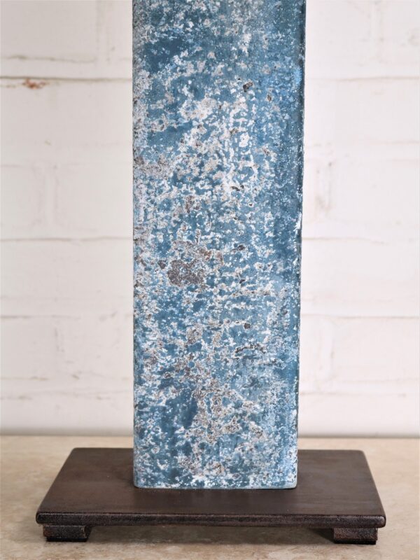 Rectangle post custom iron table lamp with a blue, distressed finish and a dark iron base.