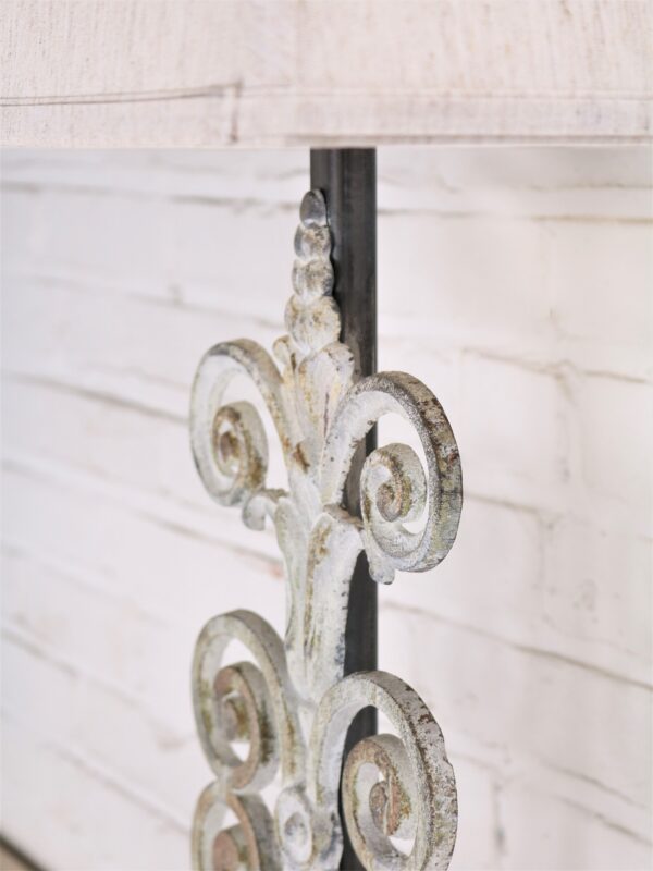 Fleur Scroll custom iron table lamp with a white, distressed finish.