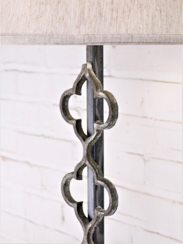 Quattuor custom iron table lamp with a gray, distressed finish.