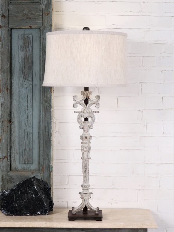Corinthian column custom iron table lamp with a white, distressed finish and a dark iron base. Paired with a 15 inch linen drum lamp shade.