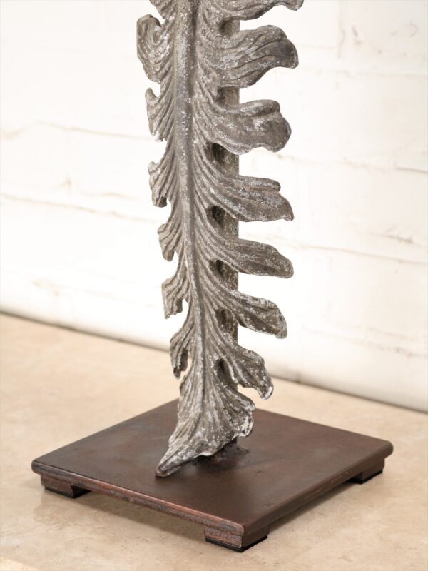 Large leaf custom iron table lamp with a gray, distressed finish and a dark iron base.