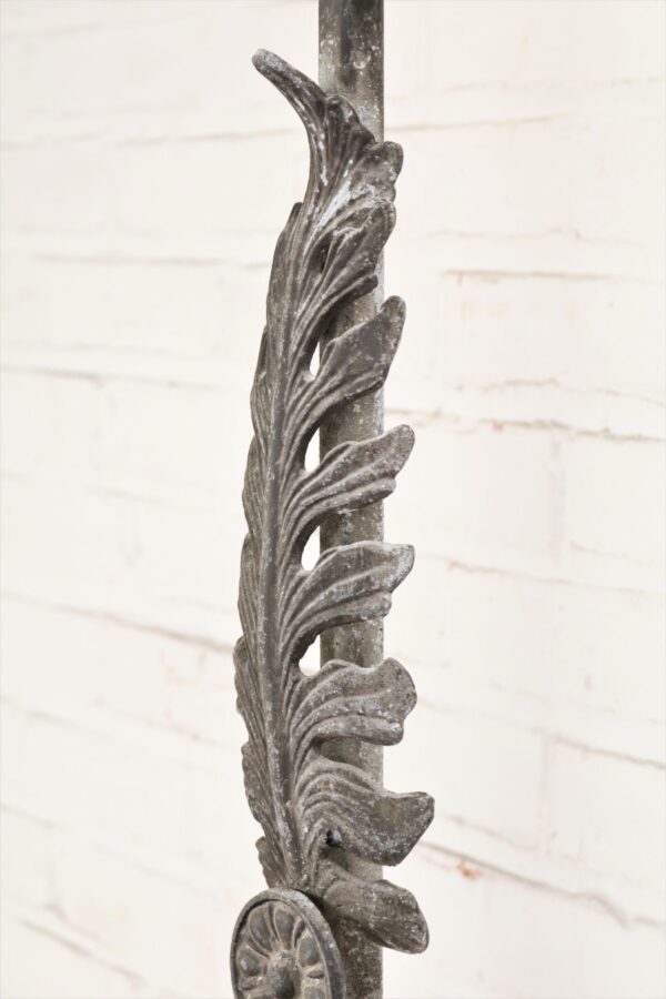 Large leaf custom iron table lamp with a gray, distressed finish.
