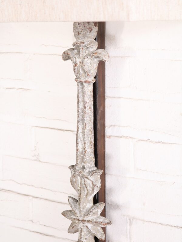 Star custom iron wall sconce with a white, distressed finish.