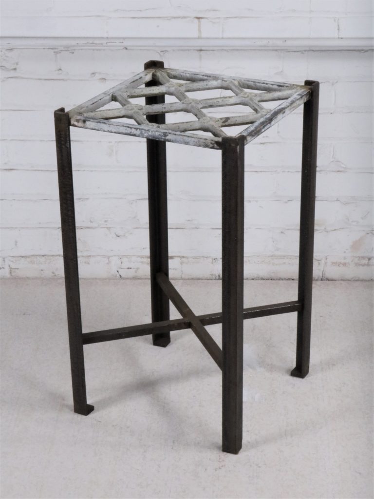 Ferro Designs LLC custom iron drink table or end table with a white distressed top and a dark iron base.