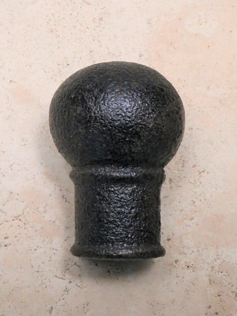 Ball finial in dark bronze.