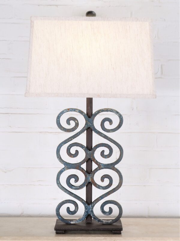 Ferro Designs LLC custom iron table lamp with a blue, distressed finish and a dark iron base. Paired with a 15 inch rectangle linen lamp shade.