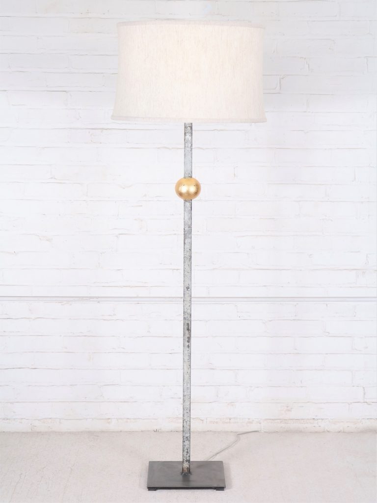 Gold ball custom iron floor lamp with a white, distressed finish and a gold leaf ball. Paired with a 19 inch linen drum lamp shade.